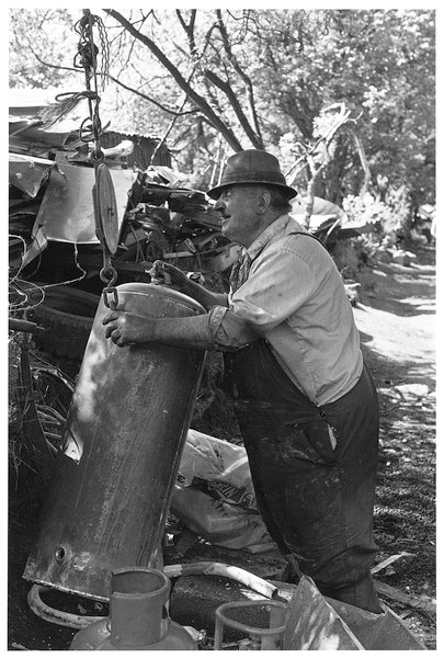 Sam Harris weighing copper scrap, Lettaford 1986.jpg